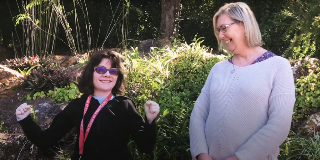 Two women looking very excited and happy.