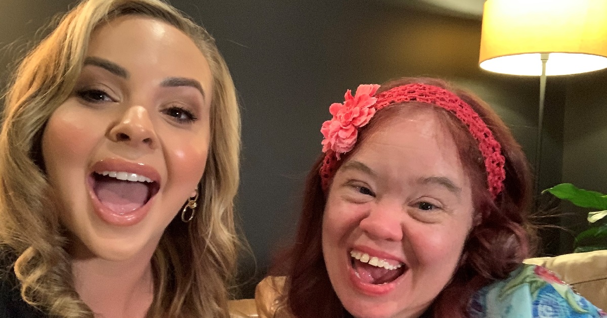 2 lovely women smiling.