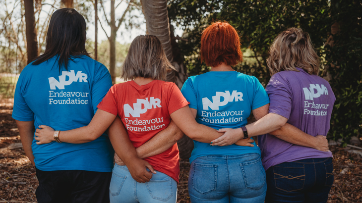 4 women wearing a endeavour shirt.