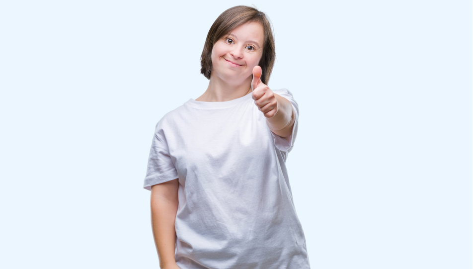 Lady smiling with thumb up.