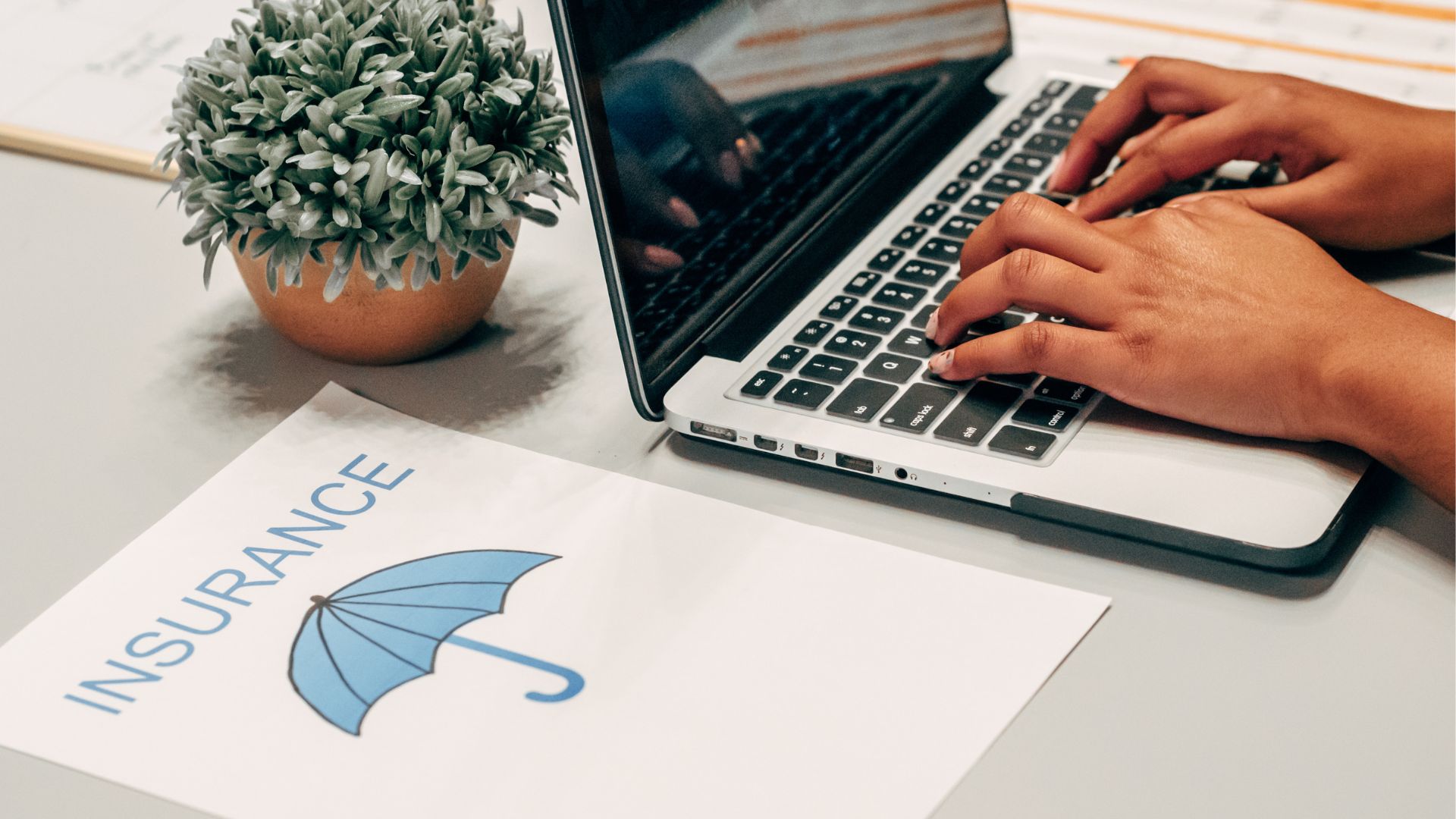 A man typing on the computer.