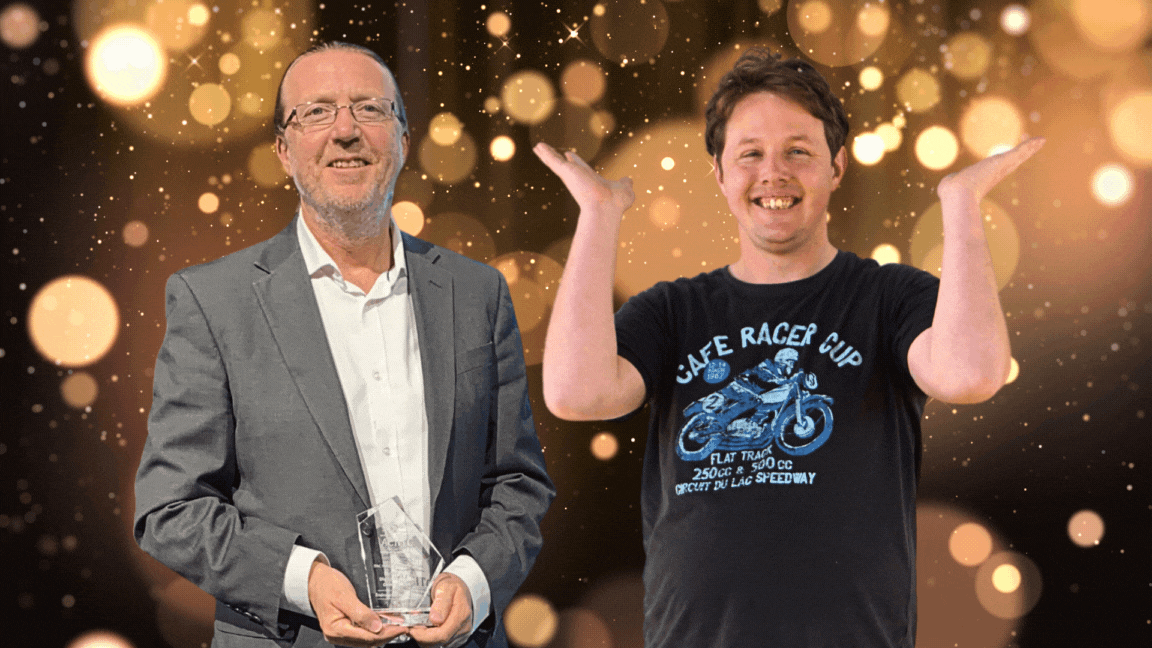 A staff member with a client who is very excited.